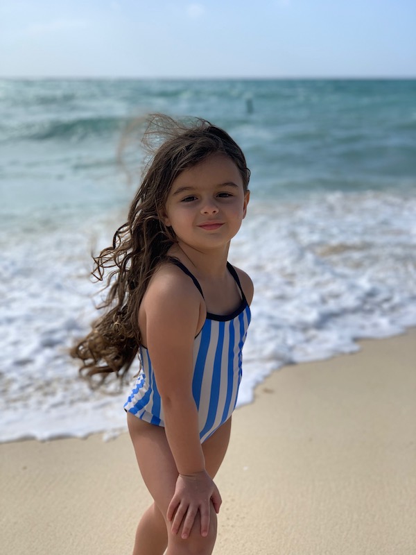 Lucy had fun chasing waves at the beach